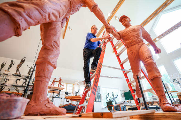 Mellon at work on his Robinson-Shuba sculpture.